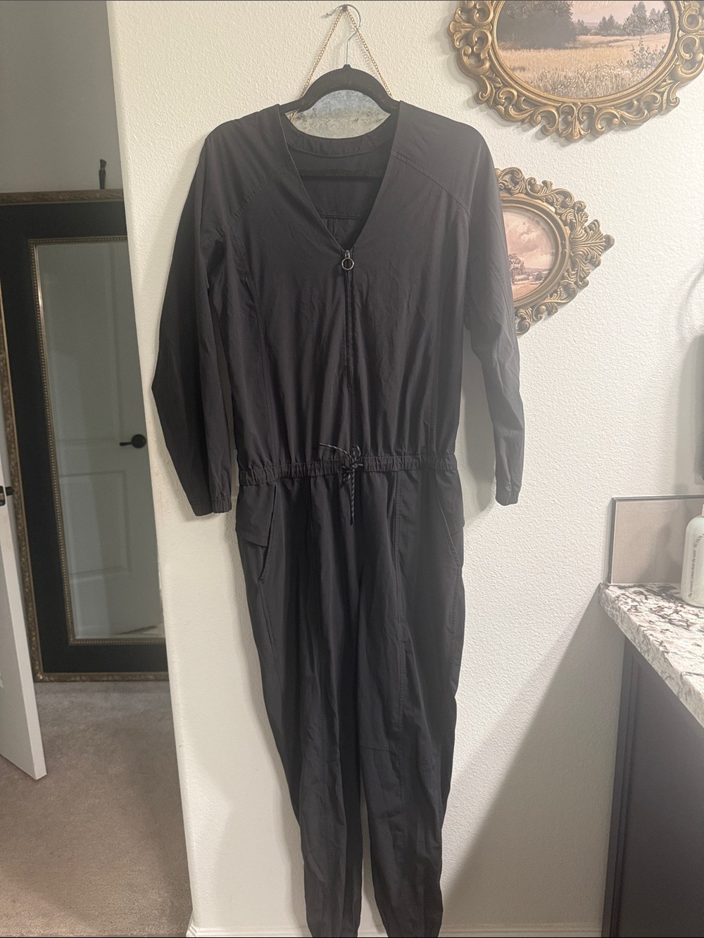Lululemon Black V-Neck Long Sleeve Jumpsuit with Drawstring Waist size 6.